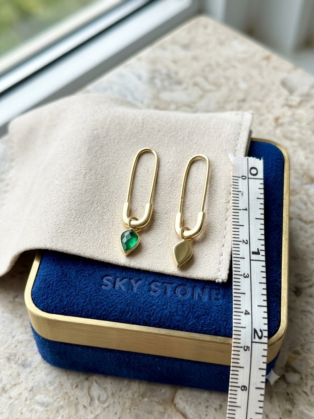 Wolf & Badger 14K gold-plated safety pin earrings with real emeralds